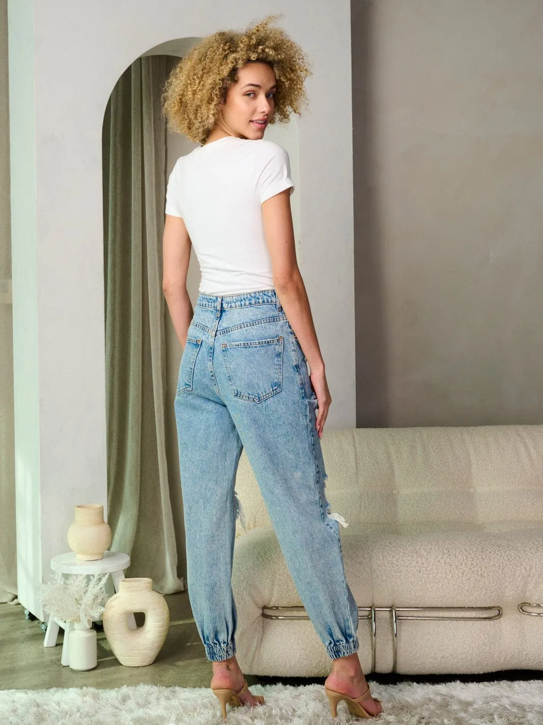WOMEN'S BUTTON CLOSURE DISTRESS WASHED DENIM PANTS